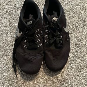 Black Nike ID athletic shoes